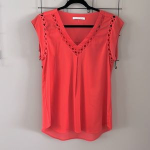 Cap sleeve cut out detailed Summer top.